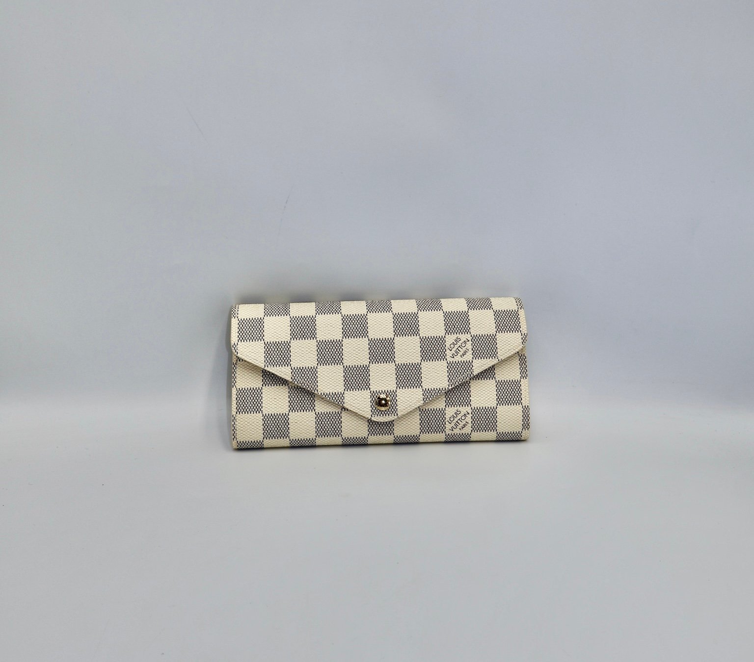 LOUIS VUITTON-CARTERA EMILE NUEVA